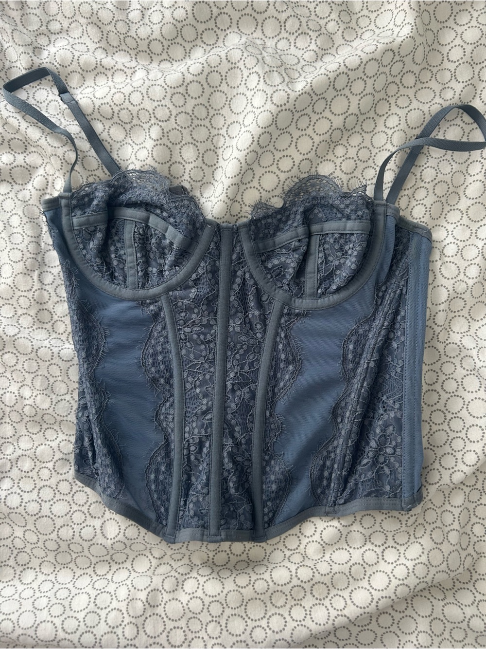 Out from under blue lace corset bustier top with straps